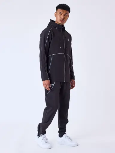 JOGGING A DETAIL REFLECHISSANT NOIR - BK